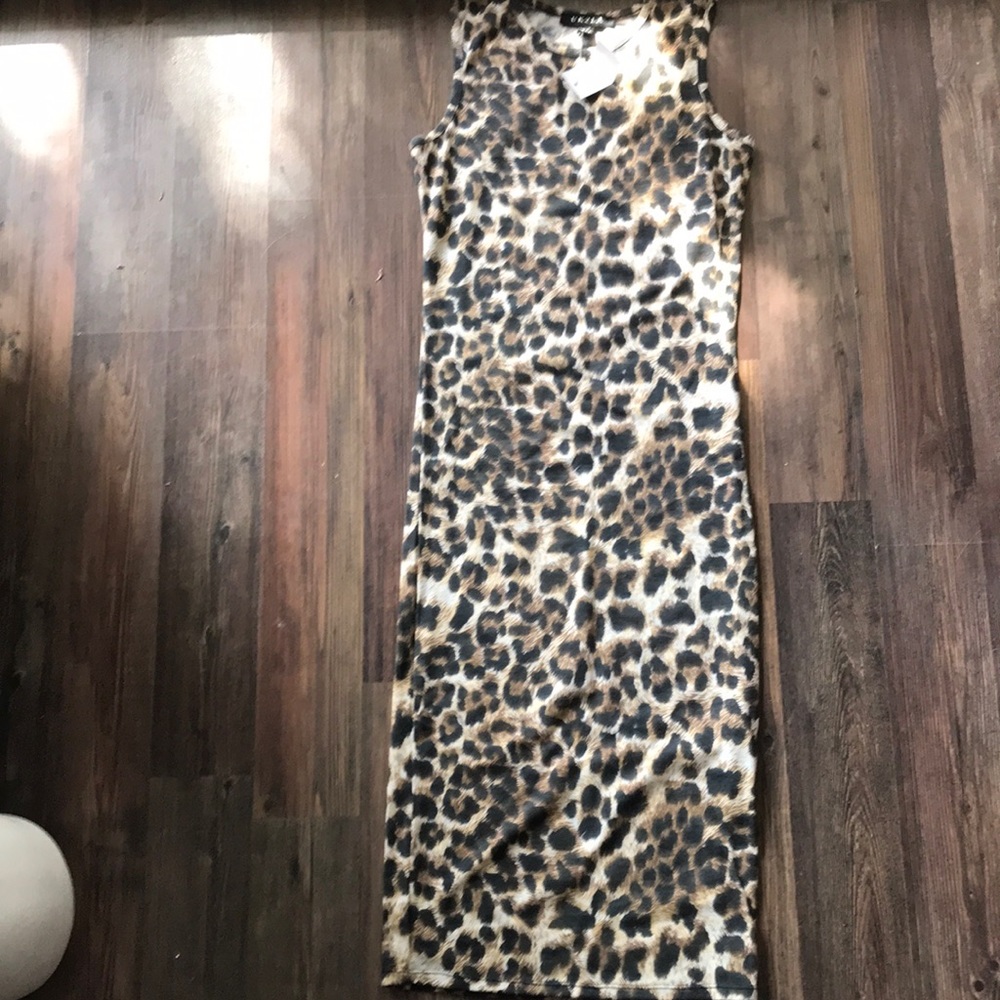 Tags attached animal print dress